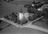 Flygfoto över Frinnaryds kyrka i Aneby kommun, Jönköpings län. 800/1964