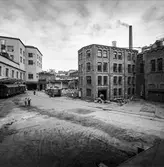 Rivning av byggnad nr 9, 10 och 11 på pappersbruket Papyrus i Mölndal, 10/6 1964.