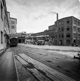 Rivning av byggnad nr 9, 10 och 11 på pappersbruket Papyrus i Mölndal, 10/6 1964.