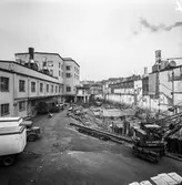 Schaktning vid byggnad nr 9 på pappersbruket Papyrus i Mölndal, 23/9 1964.