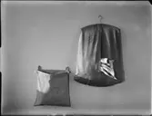 FÖRKLÄDE, NÅLDYNA, HAKLAPPAR, PLATSÖVERDRAG