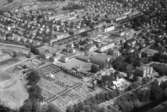 Flygfoto över Huskvarna i Jönköpings kommun. 1281/1966