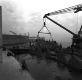 CG 27
Lyftning av CG 27 till lastfartyg