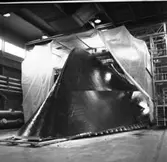 M 80
Arbetsställningar kring M 80 och plastning av däcket