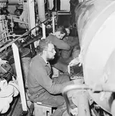 Arbetsbilder på Baltic Print i botten och maskinrum