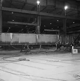 Arbete med bostadsplattformar till oljerigg och lyft till pråm för transport