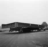 Arbete med bostadsplattformar till oljerigg och lyft till pråm för transport