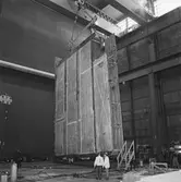 Arbete med bostadsplattformar till oljerigg och lyft till pråm för transport