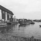 Slipdragning av 200 båt in i gamla motorverkst.