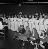 Lucia i matsalen och kontorshuset