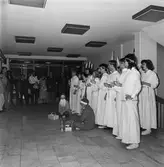 Lucia i matsalen och kontorshuset