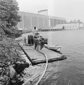 Nedläggning av elkabel i sjön mellan polhemsdockan och Skrovhallen