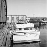 Civil motorbåt på drottninghallskaj