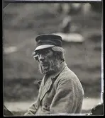 Porträtt av en man.