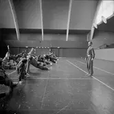 Handbollsträning med lite uppvärmning i Jönköpings Idrottshus.