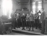 Realskolans mässingssextett. Till höger står musikdirektör August Löfman.