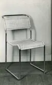 Stålrörsstol med flätad sits och -ryggstöd. 1930-tal. Nordiska Kompaniet.