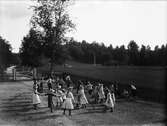 Ringlek, sannolikt vid Berge skola, Timrå socken, Medelpad 1910