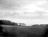 Landskapsvy med Ekolsundsviken, Husby-Sjutolfts socken, Uppland maj 1919