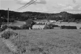 Vy mot Hällesåkersby från Gårdaliden, 1991.