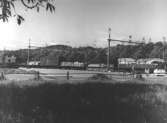Spårområdet med godsvagnar vid Mölndals nedre, sett från väster. 1940-50-tal.