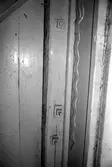 Kvarnfallet 31 i Grevedämmet, hösten 1994. Interiör i fabriksbyggnad. Byggnadsdetalj: Dörrkarm.