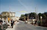 Järnvägsövergången på Mölndal bro, år 1959. Kvarnbygatan i bakgrunden.