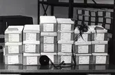 Arkivfotografens stilleben: 20 lådor = 40 000 blanketter ryms på en 30 meter lång filmrulle.