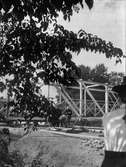 Bron vid Skolgatan under flyttning till Odensgatan, Uppsala 1901