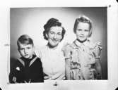 Reproduktion
Kvinna med två barn