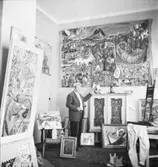 Portätt av konstnären Uno Vallman i sin ateljé
Interiör