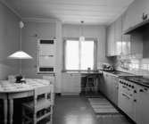Enplansvilla i Norrland
Interiör, kök med spis och runt matbord