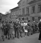 Studentfinal, 1944. 
En grupp studenter m.fl. är på väg uppför Storgatan mot Stortorget.

Angående avgångsklassen 1944 - se 