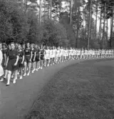 Gymnastiken 1944.
Inmarsch av gymnaster på Värendsvallen.