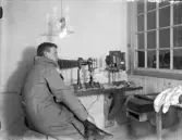 Man med kamerautrustning, Österbybruk, Uppland