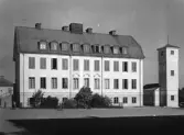 Östra skolan i Almby med brandstationen, 1950-tal