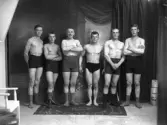 Grupporträtt medlemmar från atletklubben Heros från tidigt 1900-tal.