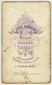 Baksida till visitkort från Alfred Hermansson, efter 1875