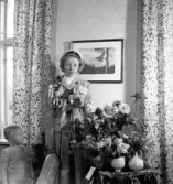 Olsson, realexamen 1950. Taget i bostaden