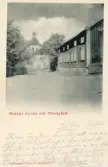 Brevkort adresserat till sjuksköterskan Amanda Palm, 1903. Motiv av Gnarps kyrka och prästgård. Carl Wibergs Bokhandel, Hudiksvall.
Text på framsidan: 