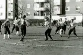 Fotbollslaget Jitex BK spelar match på Frejaplan i Mölndal, ca 1989-1993. Motståndarlag och slutresultat är okända. Frejaplan ligger intill Mölndals idrottshus.