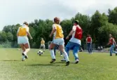 Fotbollsmatch på Krokslättsvallen i Mölndal under Jitexdagen i juli 1991.