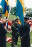 Nationaldagsfirande i Stadshusparken i Mölndal den 6 juni 1999. I bakgrunden Mölndals Paradorkester.