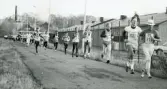 Motionsloppet i löpning Mölndalsbroloppet på 1980-talet. Här ses några av löparna vid Frölundagatan.