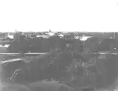 I förgrunden synes tegelrörsupplag från Falkenbergs Tegelbruk AB.  Motivet finns också som vykort.