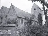 Foto av en kyrkobyggnad i Normandie, 1921.
