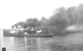 Tankbåt i brand natten till den 30 augusti 1934.  Båten låg vid kaj då branden utbröt, varför man fick dra ut den till öppet vatten på grund av explosionsrisken.