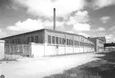 Dan Lundgrens läderfabrik. Delar av anläggningen  uppfördes 1899, i feb. 1900 var verksamheten igång. På byggnaden närmast finns årtalet 1922.