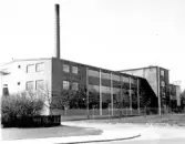 Dan Lundgrens läderfabrik. Delar av anläggningen  uppfördes 1899, i feb. 1900 var verksamheten igång. Första större branden var 1914, den andra 1956.