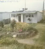 Text på baksida av foto: Kiosken v Stafsinge Strand fick inte vara kvar